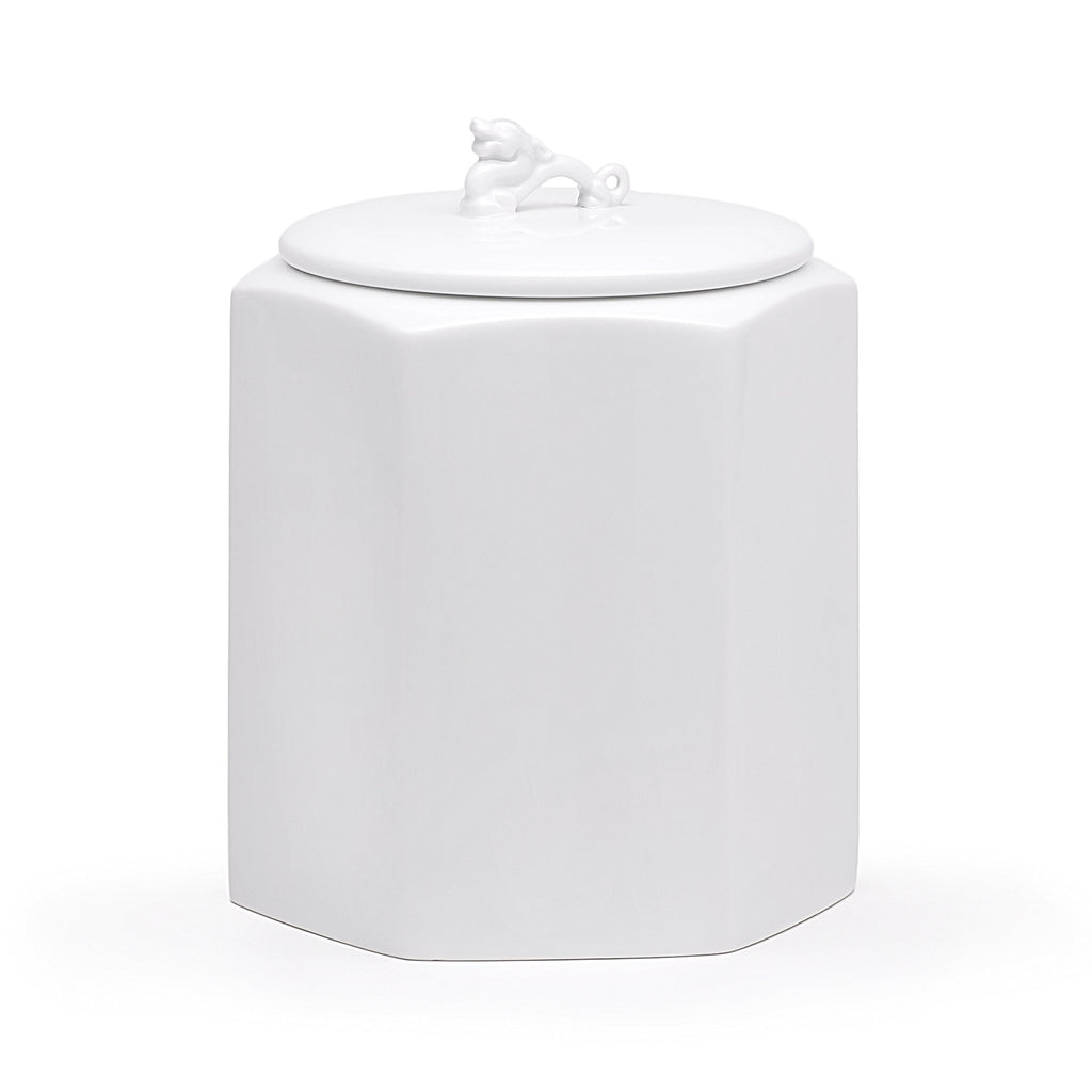 White hexagonal porcelain storage jar with dragon lid figurine