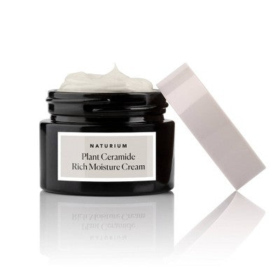 Naturium moisture cream jar with open lid and thick white cream inside