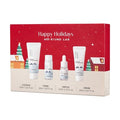 Holiday 4-piece travel skincare gift set box with four miniature products