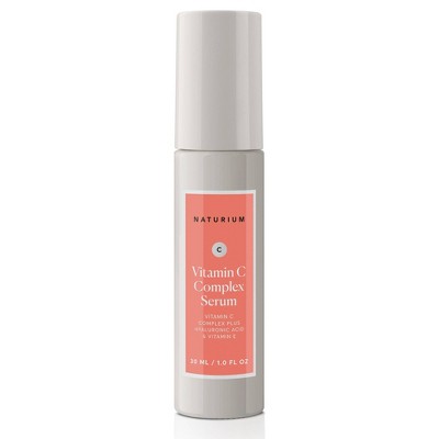 Naturium Vitamin C Complex Serum pump bottle, white and gray with coral label panel