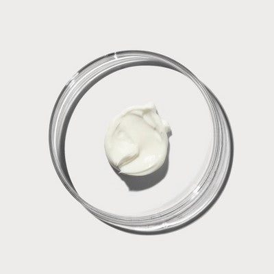 Open jar of Naturium ceramide-rich moisturizer with visible cream texture