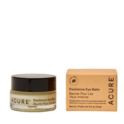 Eye balm jar with black lid and pale cream, plus product box