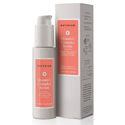 Naturium Vitamin C Complex Serum bottle with matching product box, white and coral design