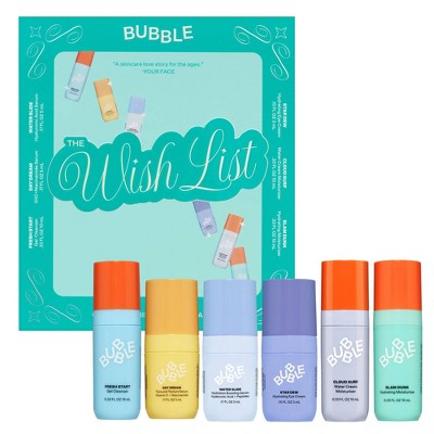 Skincare mini gift set box with six mini bottles in teal and pastel colors