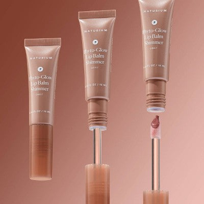 Shimmer lip balm tube and applicator wand with pink tinted product on tip
