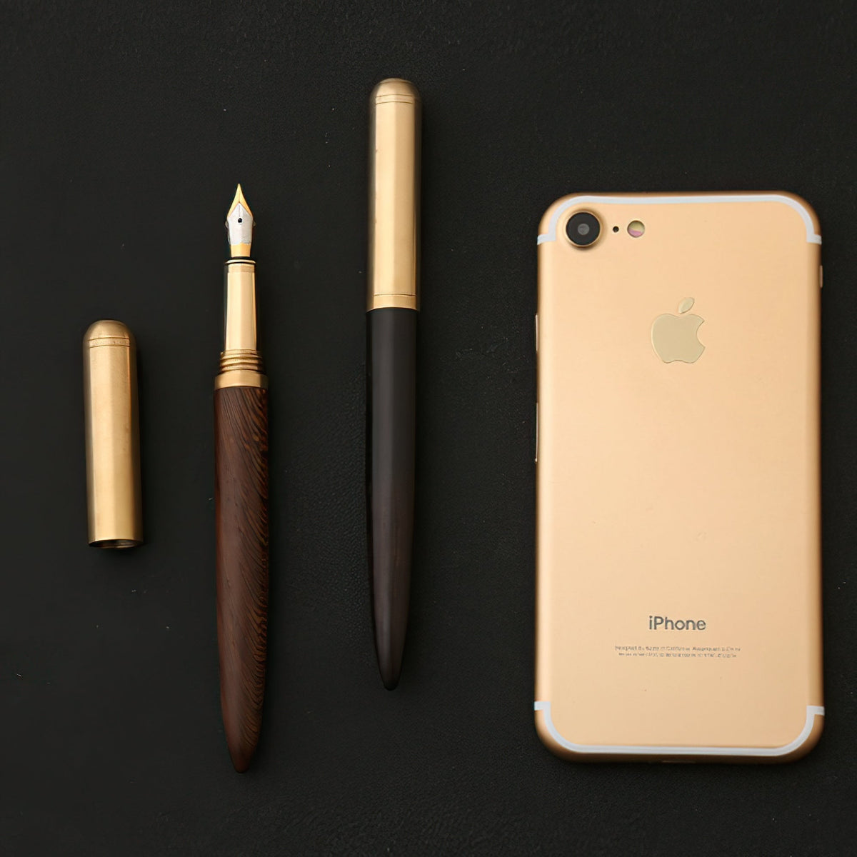 Handmade fountain pen with wood barrel, gold trim, and fine nib