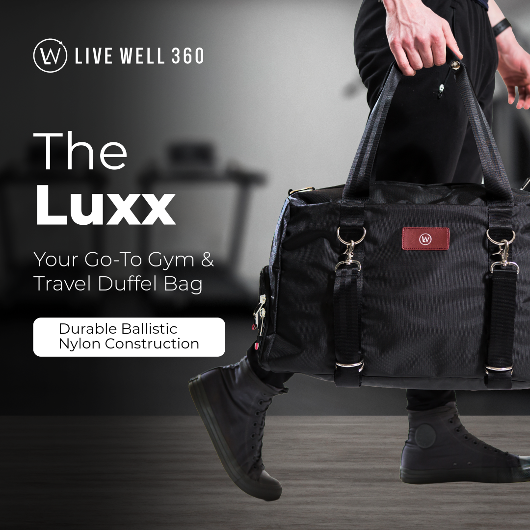 Black duffel bag with dual top handles, front organizer panel, and hanging key hooks