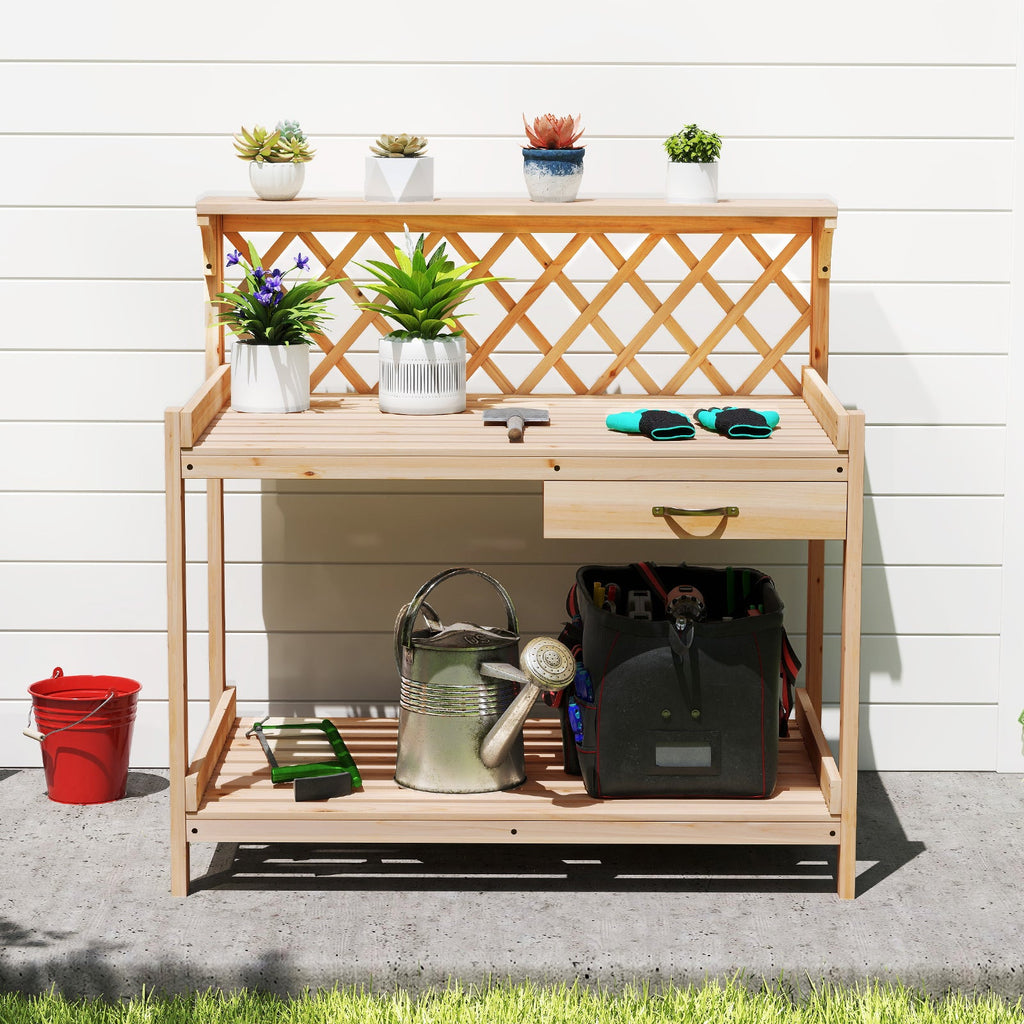 Wooden potting bench with lattice trellis, top planters and tools in lower storage