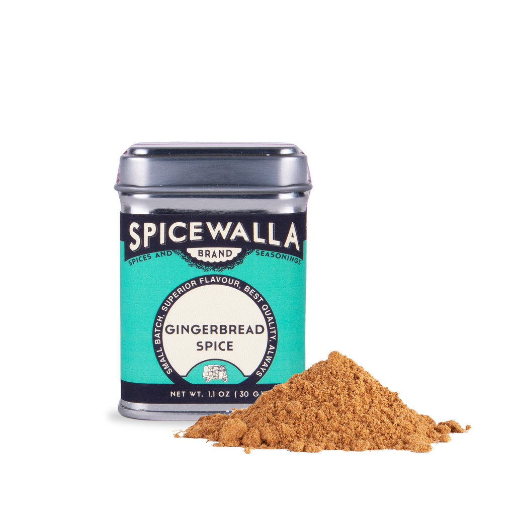 Gingerbread spice blend jar tin with mound of gingerbread spice powder