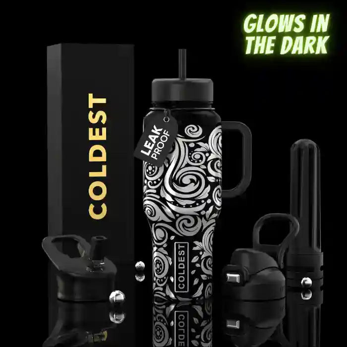 COLDEST 36oz insulated water bottle, black with white swirl pattern and flip straw lid