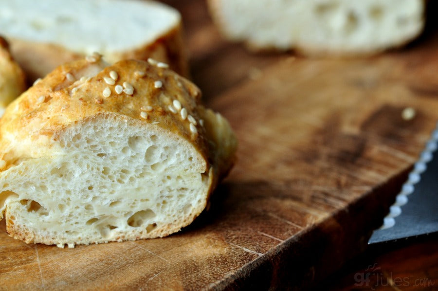 Gluten-free pizza crust roll cut open, showing fluffy interior crumb