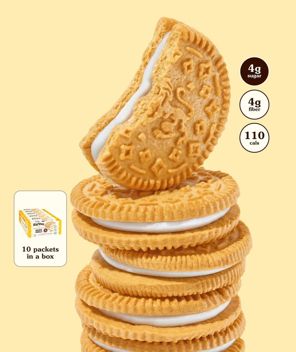 Stack of golden vanilla cookie sandwiches with white cream filling