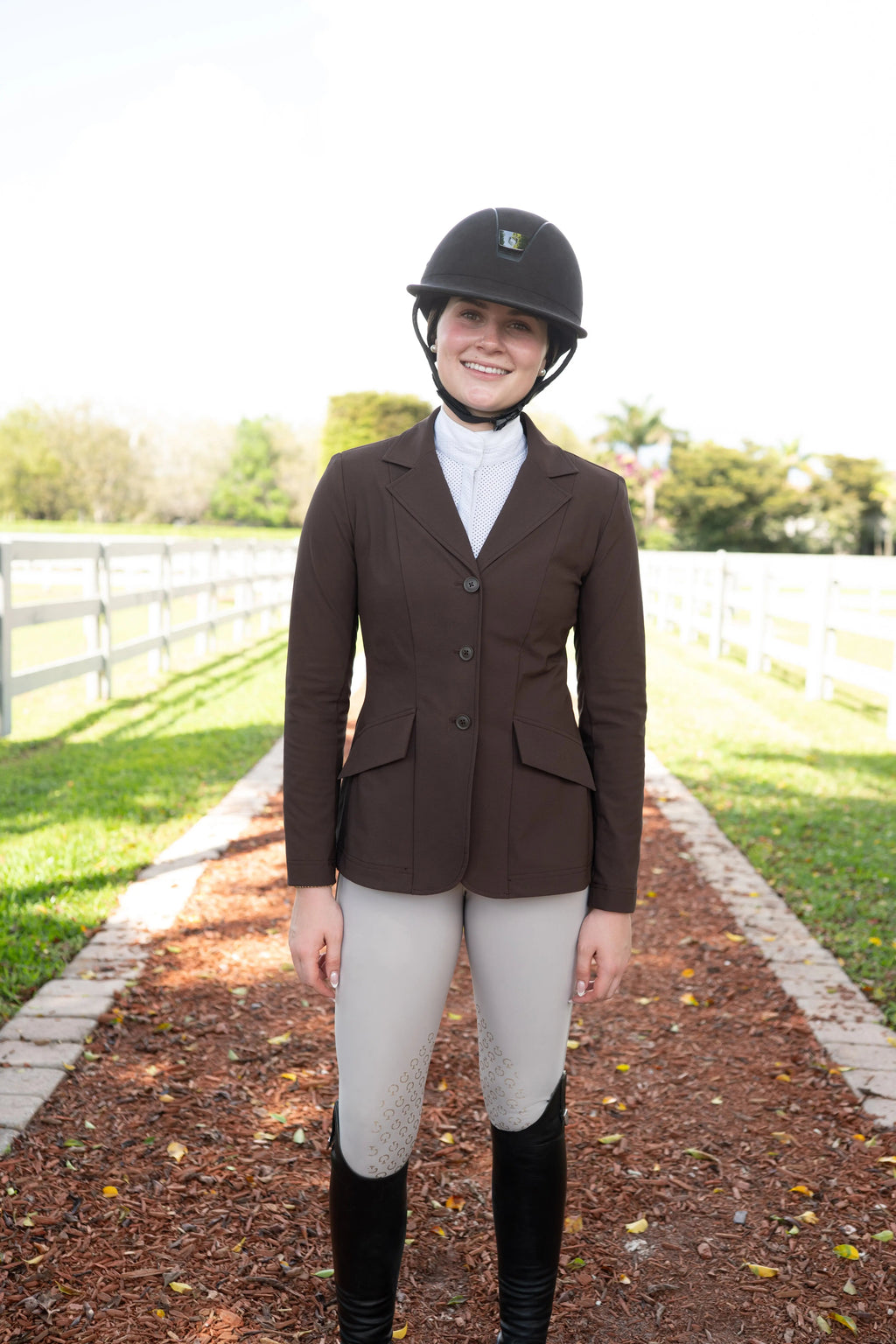 Women’s chocolate-brown show coat with three-button front and side pockets