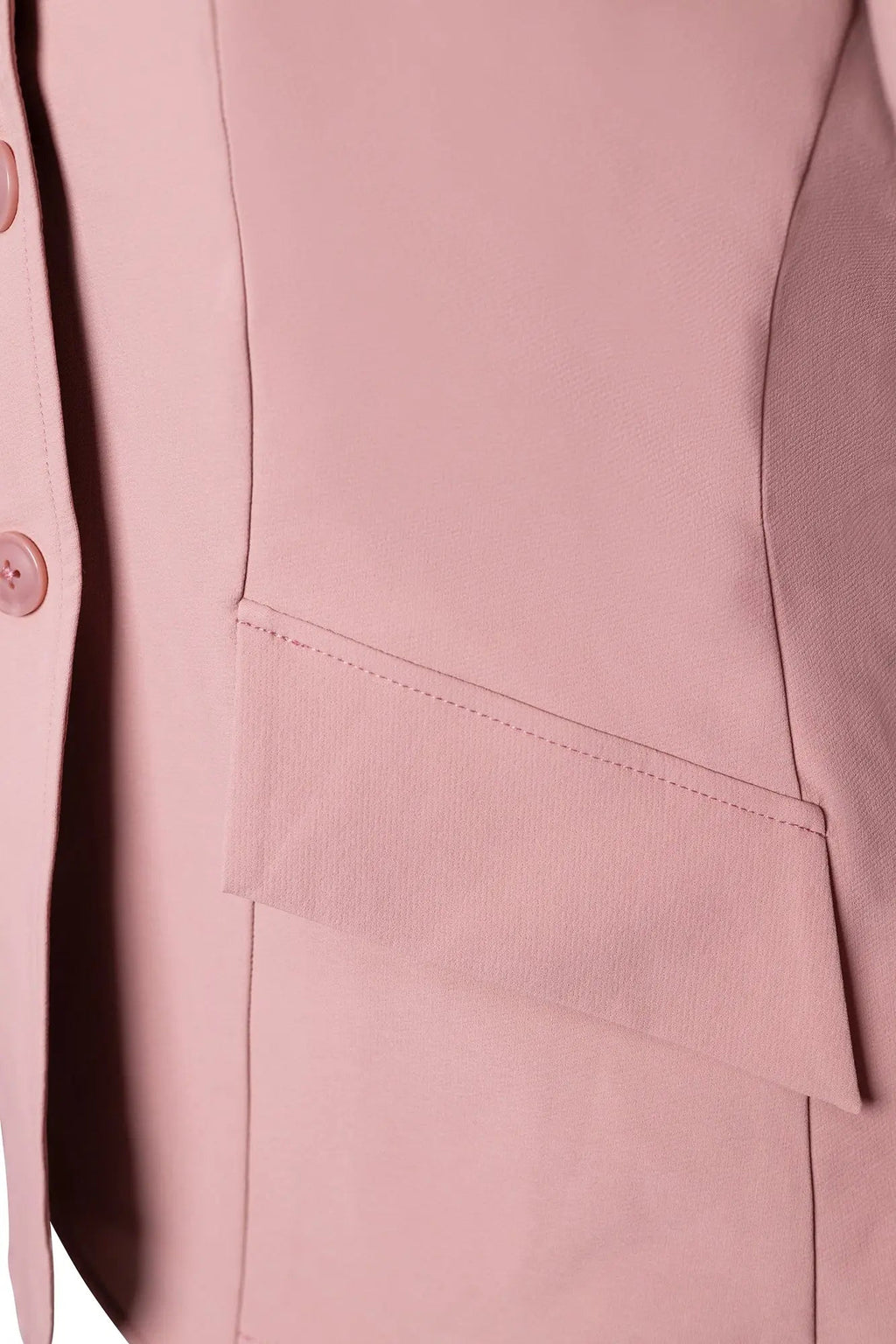 Rose pink show coat detail close-up of seam lines and pocket flap edge