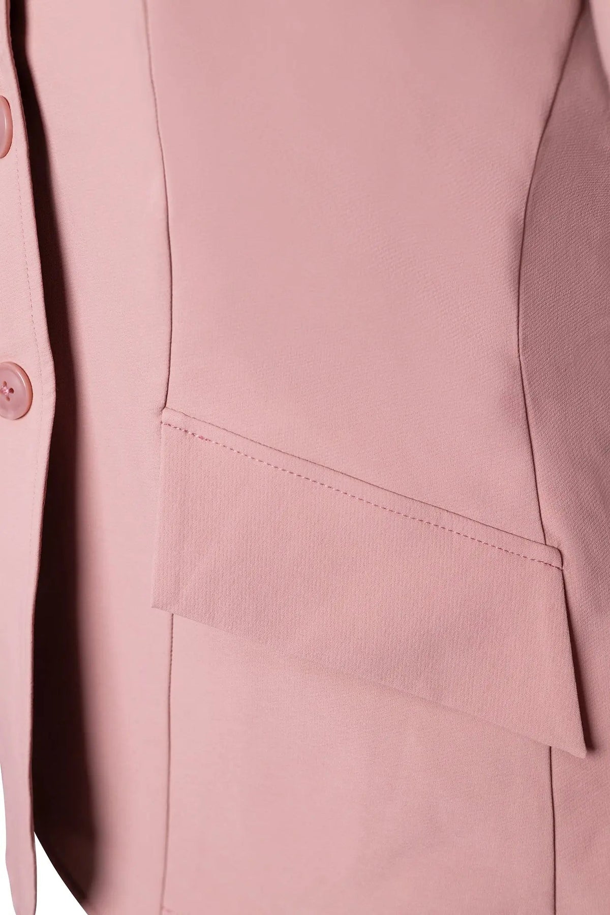 Rose pink show coat detail close-up of seam lines and pocket flap edge
