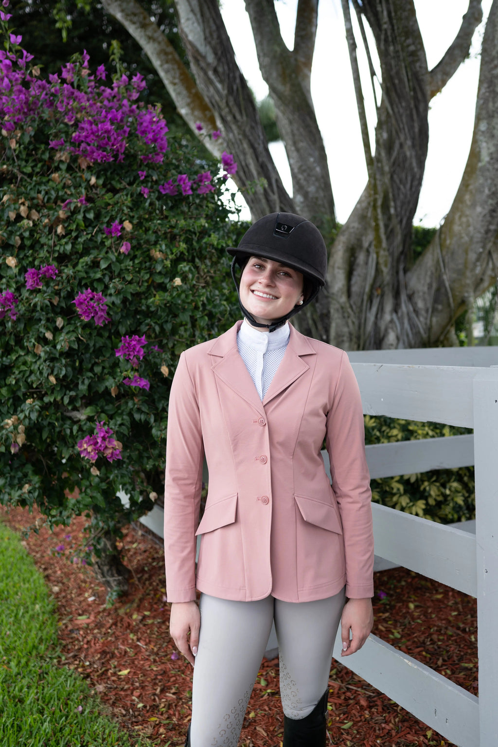 Rose pink ladies show coat with three-button front and flap pockets