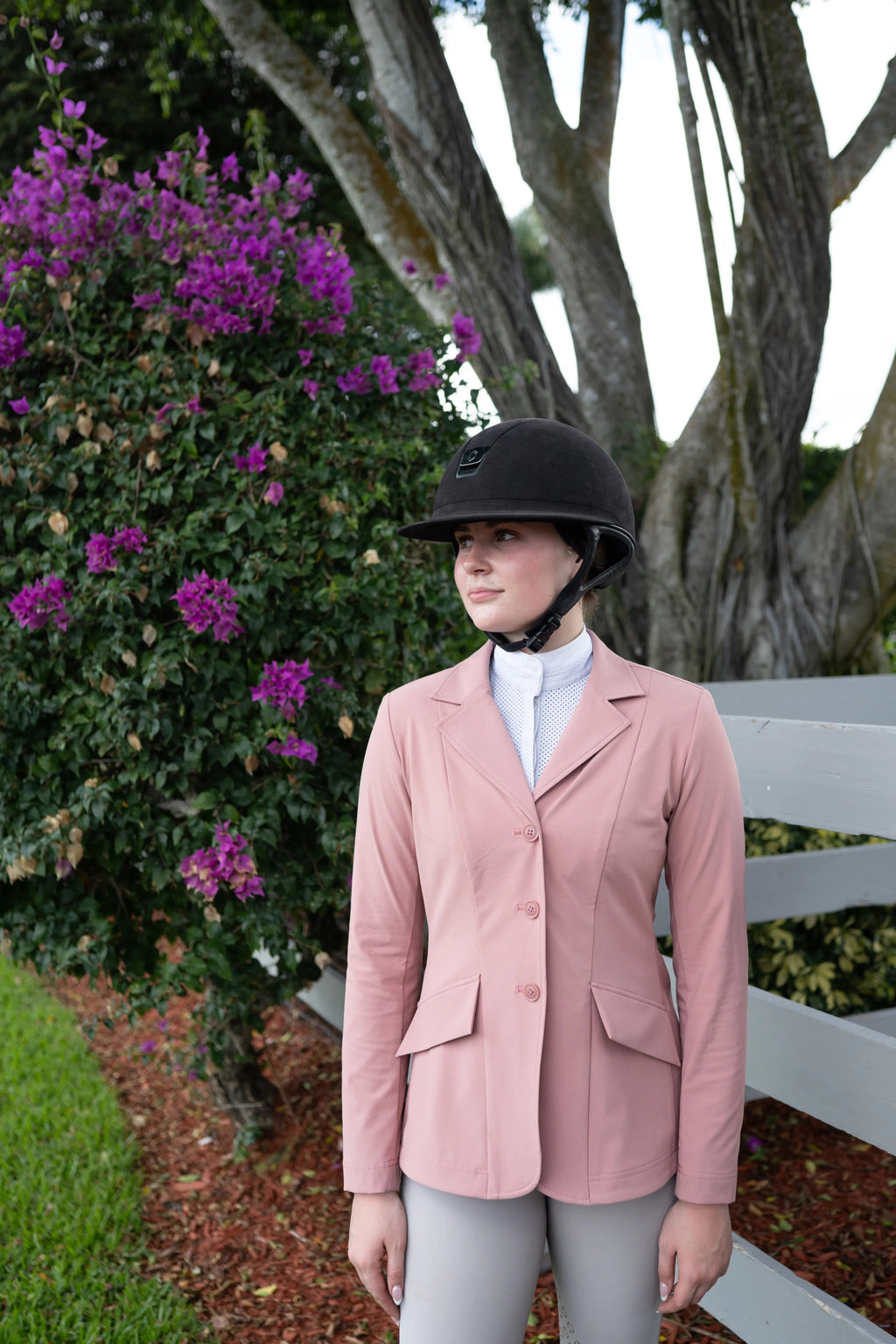 Rose pink ladies show coat with three-button front and side flap pockets