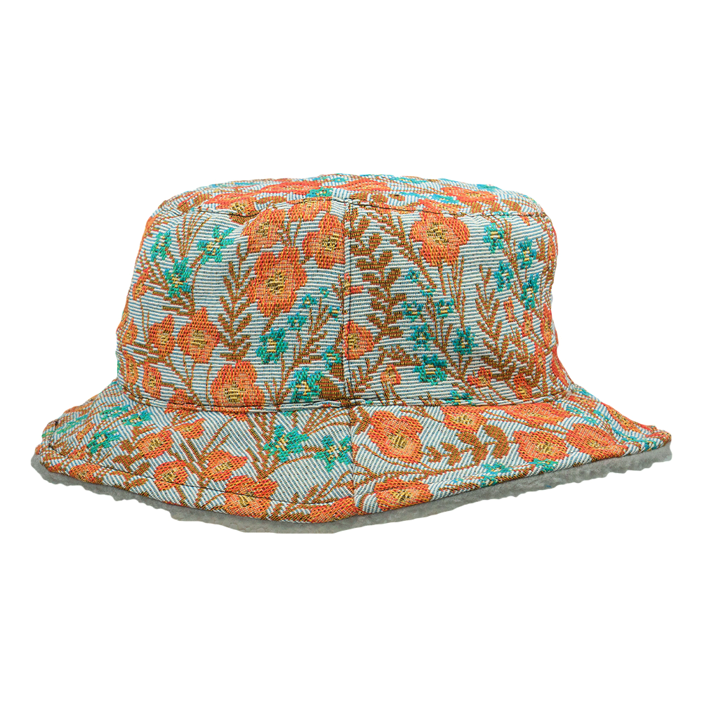 Reversible bucket hat with orange floral pattern and teal accents, wide brim