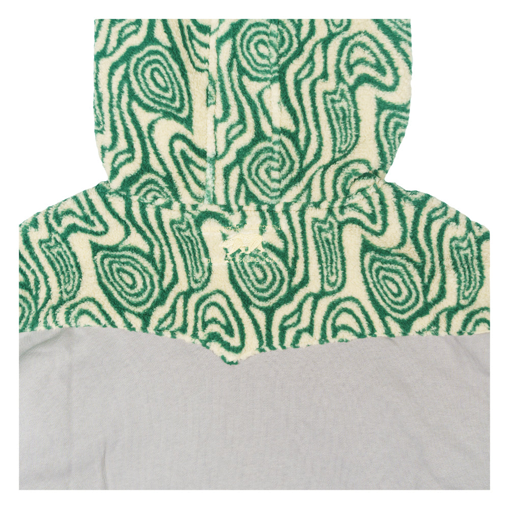 Green patterned faux-fur hood lining on a light gray zip-up hoodie with bear design edge