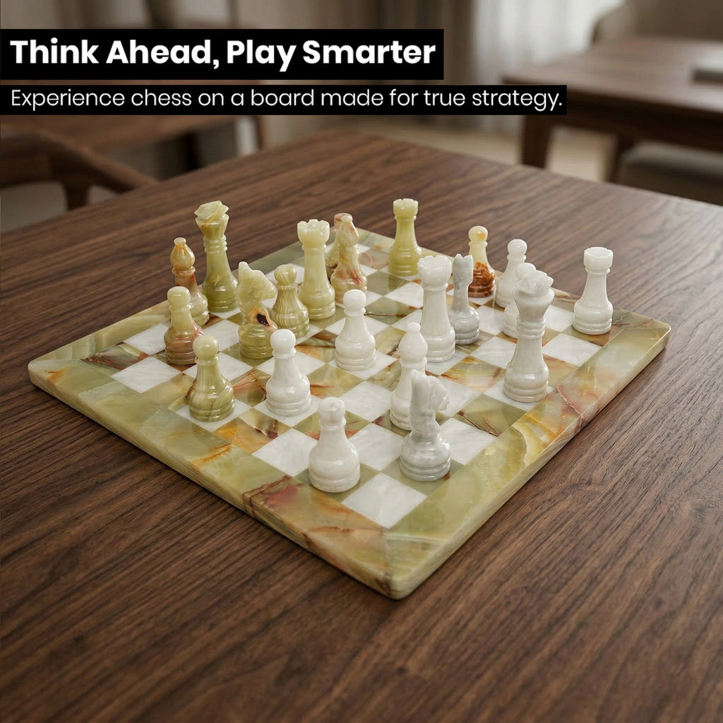 Marble chess board with gold and white pieces arranged for play on the checkered surface