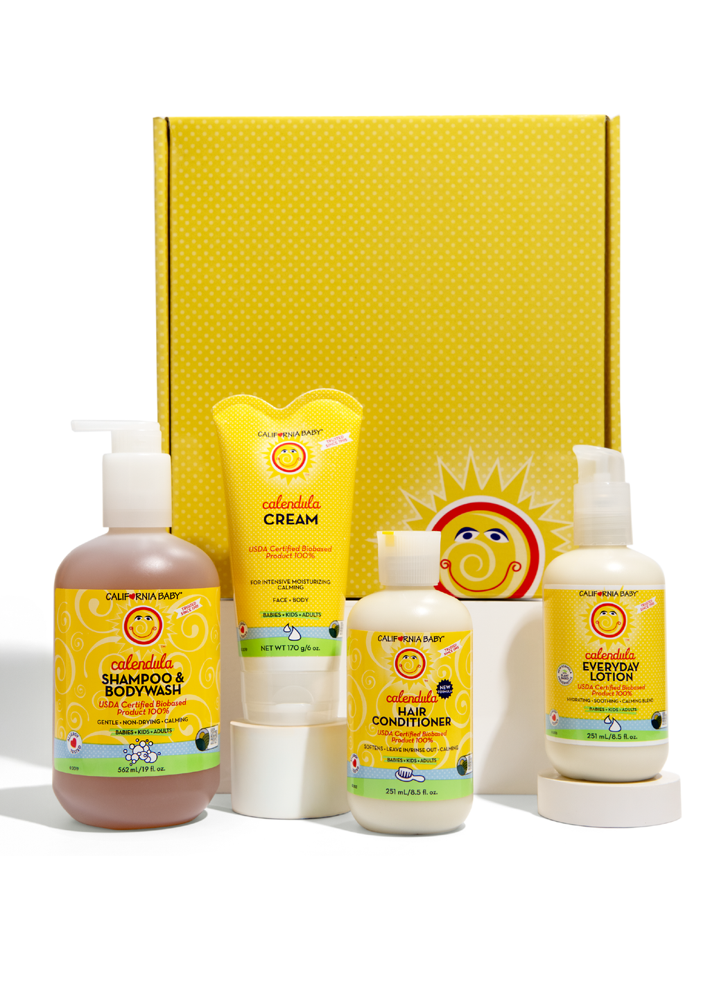Calendula gift set with yellow box and six skincare bottles, tubes, and pump