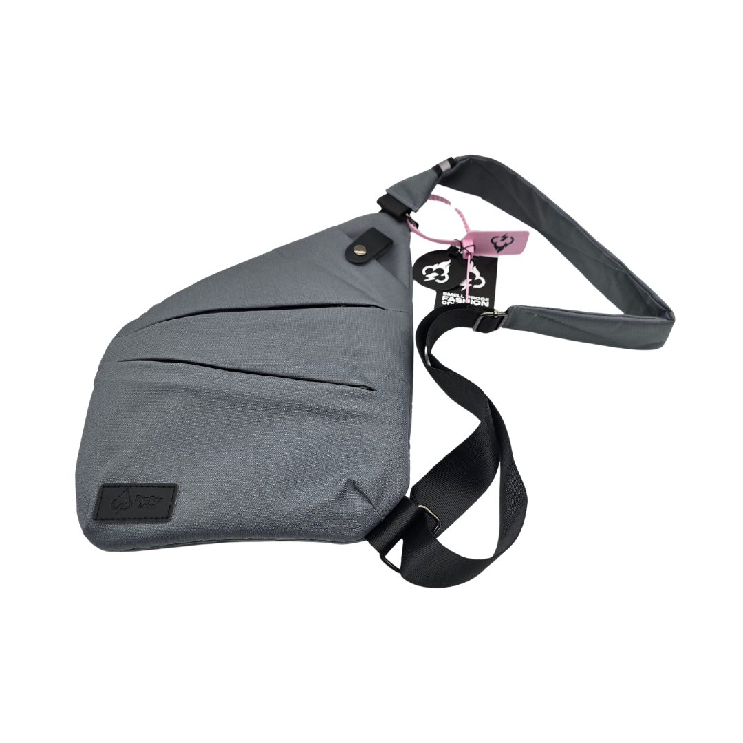 Gray crossbody bag with long shoulder strap and side carry handle
