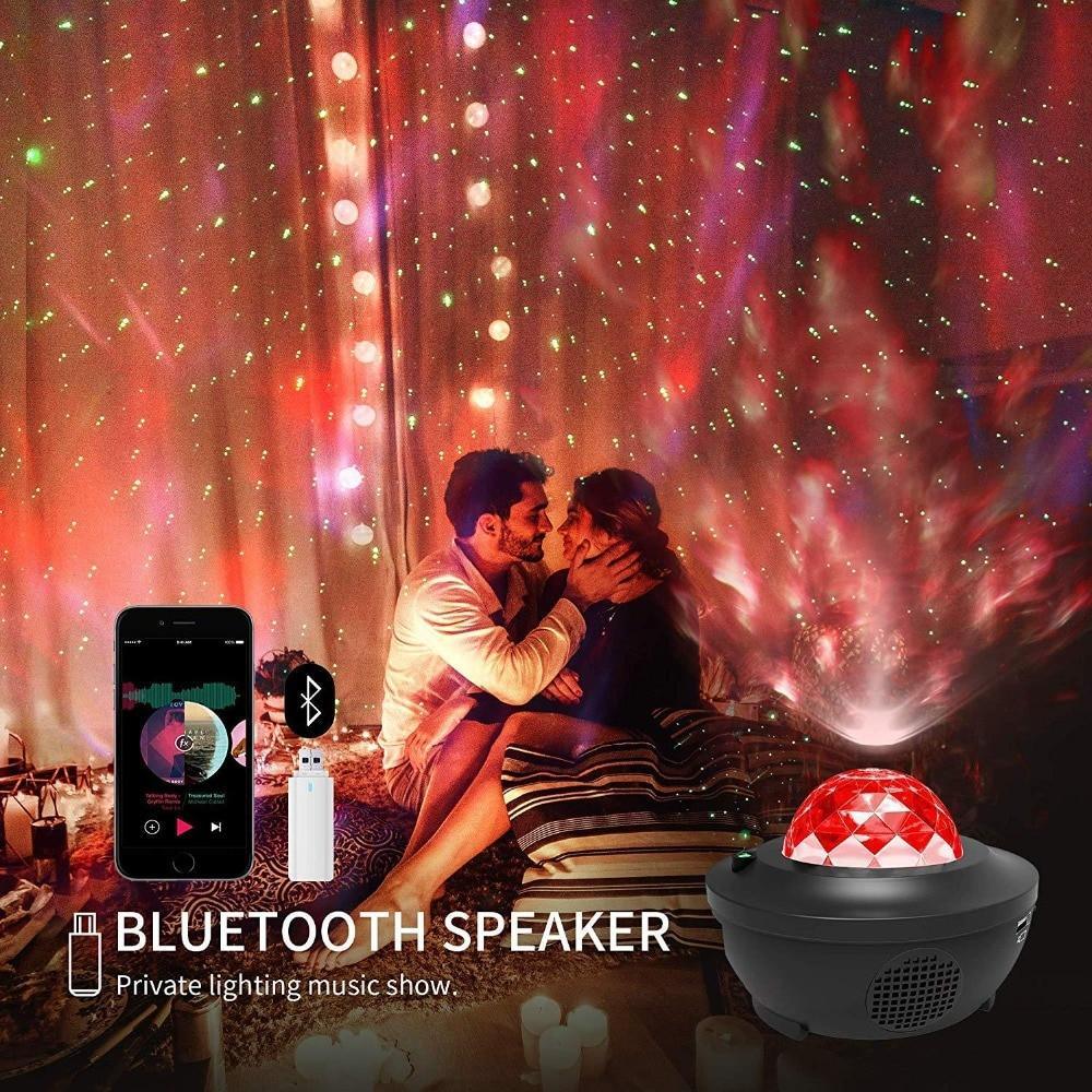 Black LED Bluetooth speaker projector with red dome glow and wireless controls