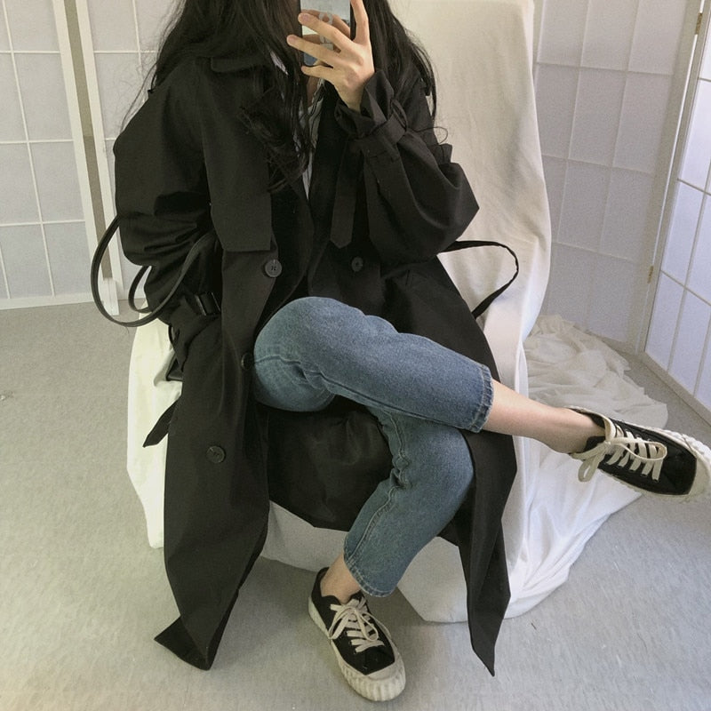 Black long overcoat with belt, two-row button closure, side pockets
