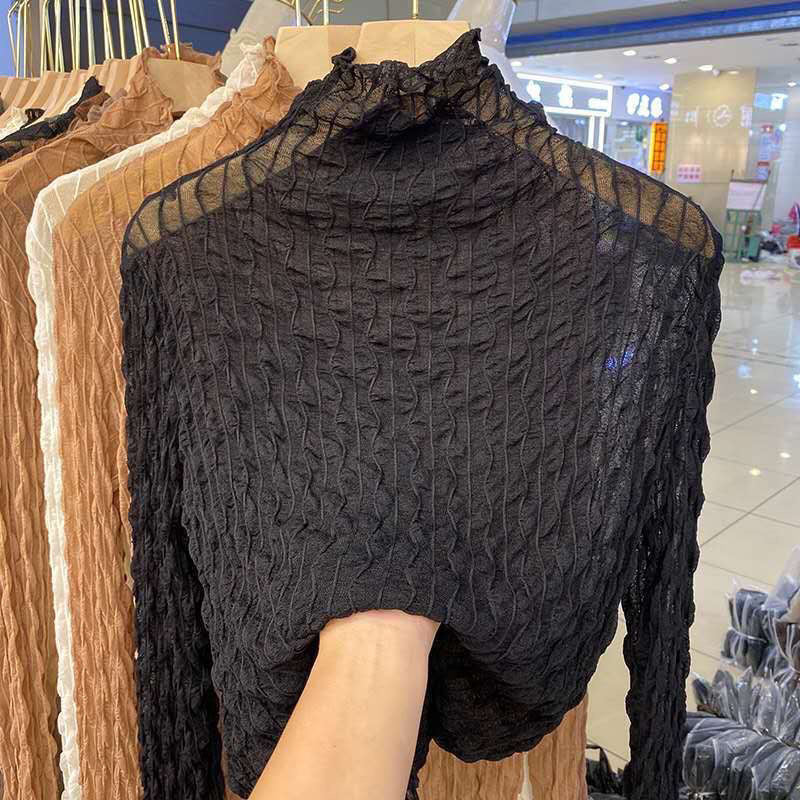 Black lace mesh high-collar long-sleeve fitted top with ruffled neckline