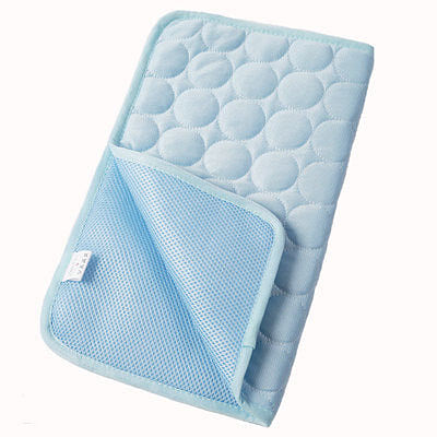 Light blue dog cooling mat cushion with mesh panel and rounded bubble texture