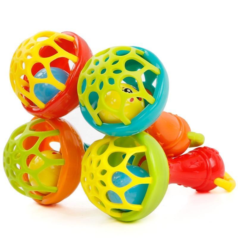 Baby plastic rattle set with red, green, yellow and blue ball grips