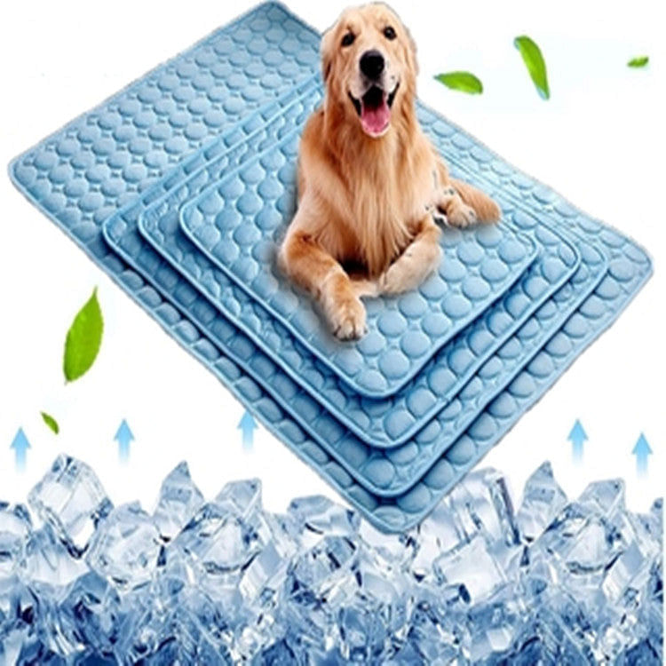 Light blue dog cool pad cushion mat with raised bubble pattern, folded edge
