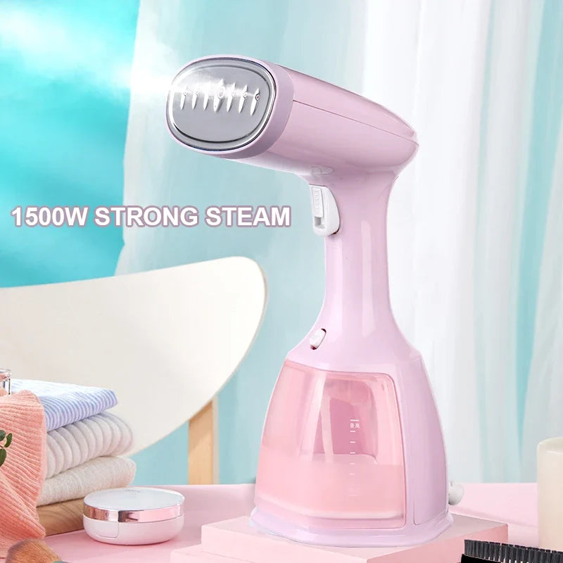 Pink handheld garment steamer on base with water tank window