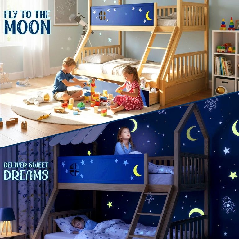 Wooden kids bunk bed with navy star-and-moon front panels and built-in ladder