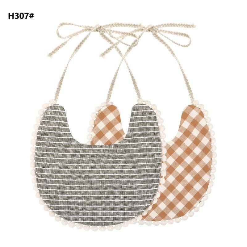 Infant bib set with tassel ties, double-sided dark gray stripes and tan plaid reverse
