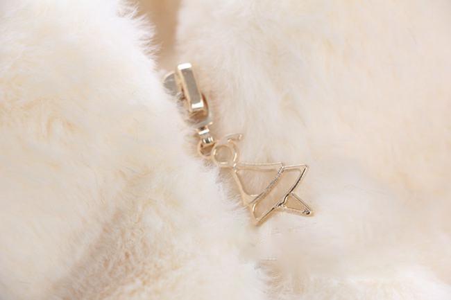 Cream plush hooded jacket zipper pull with metal charm detail