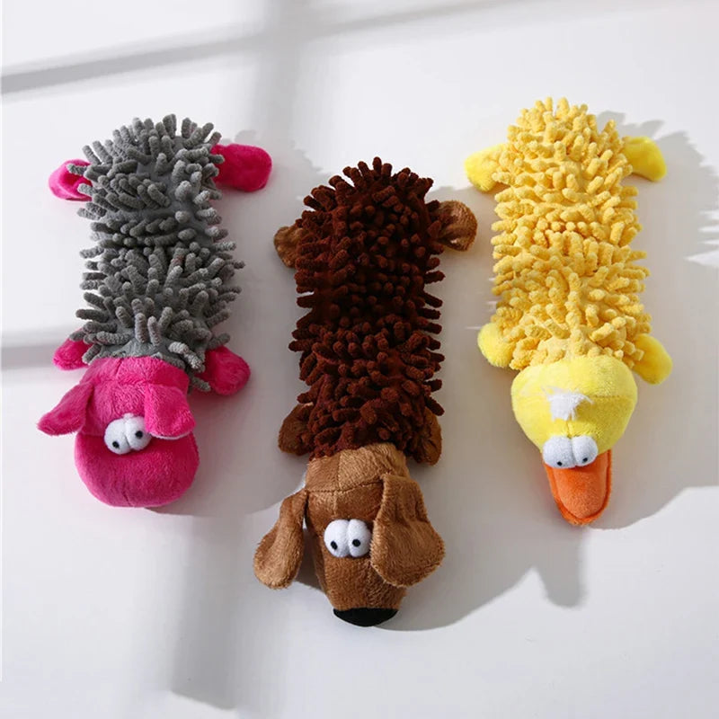 Assorted squeaky plush dog chew toys in gray, brown, and yellow animal shapes