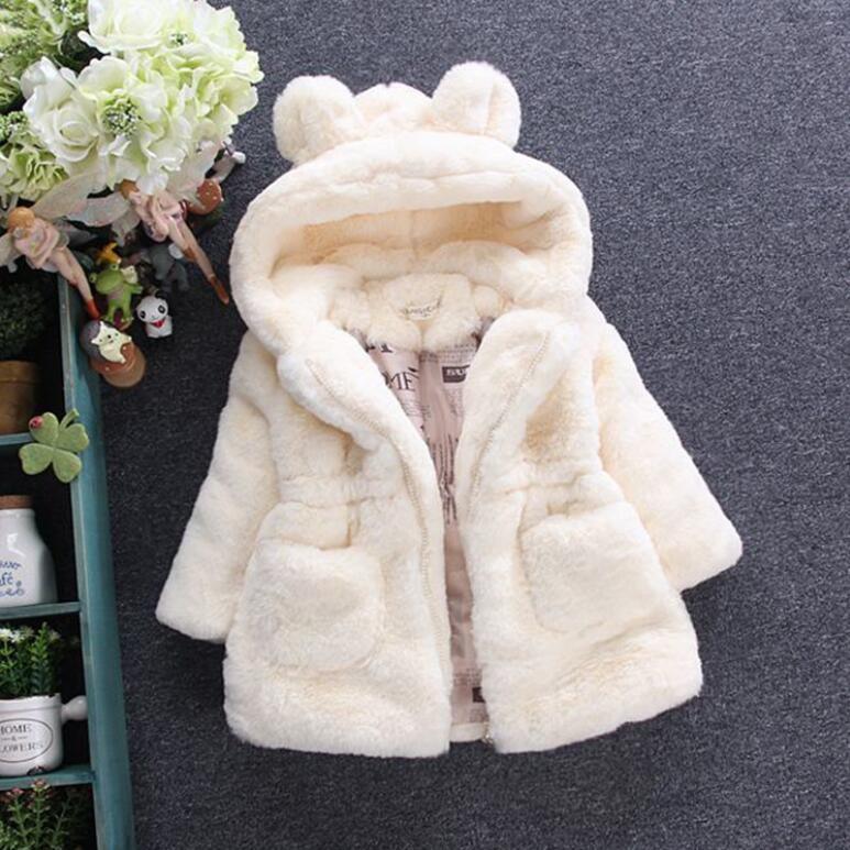 Cream hooded plush jacket with bear-ear hood detail and full front zipper