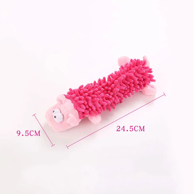 Pink spiky plush pig-shaped dog chew toy with white muzzle and small red ear