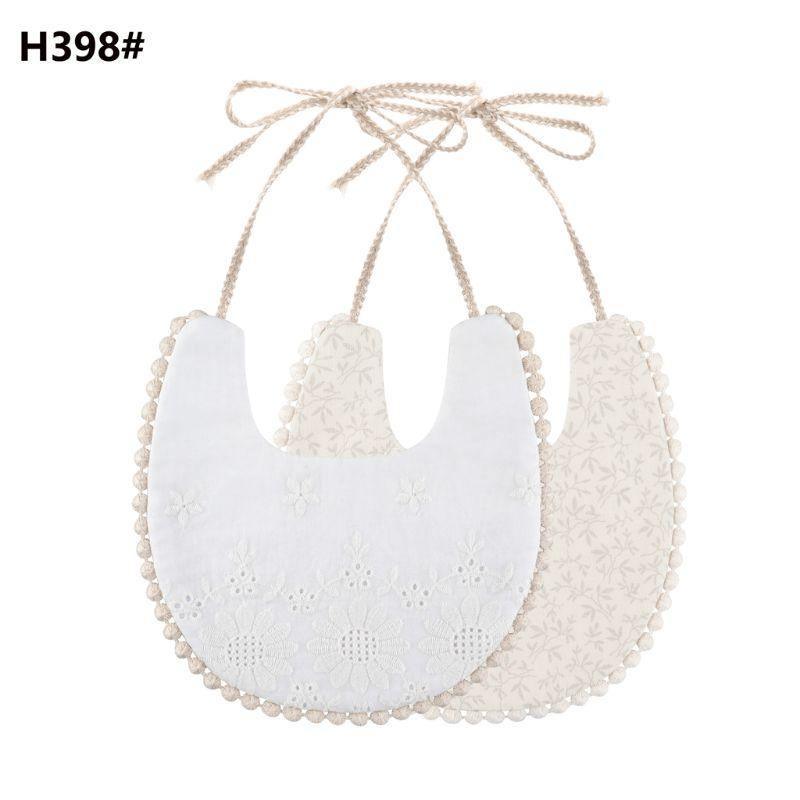 Baby bib set with tassel ties, double-sided white eyelet look and pale floral reverse