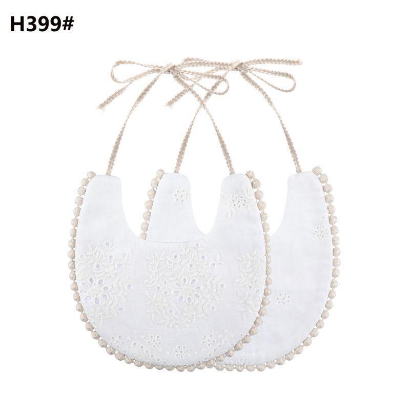 Baby bib set with tassel ties, double-sided white with delicate cutwork floral texture