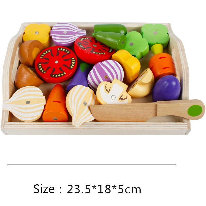 Wooden tray filled with mixed toy fruit and vegetable slices with a wooden handle