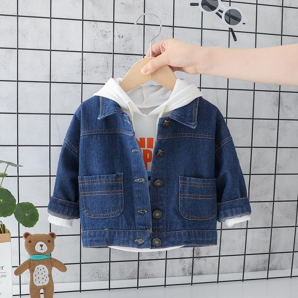 Blue denim baby jacket with hood, button front, and chest patch pockets