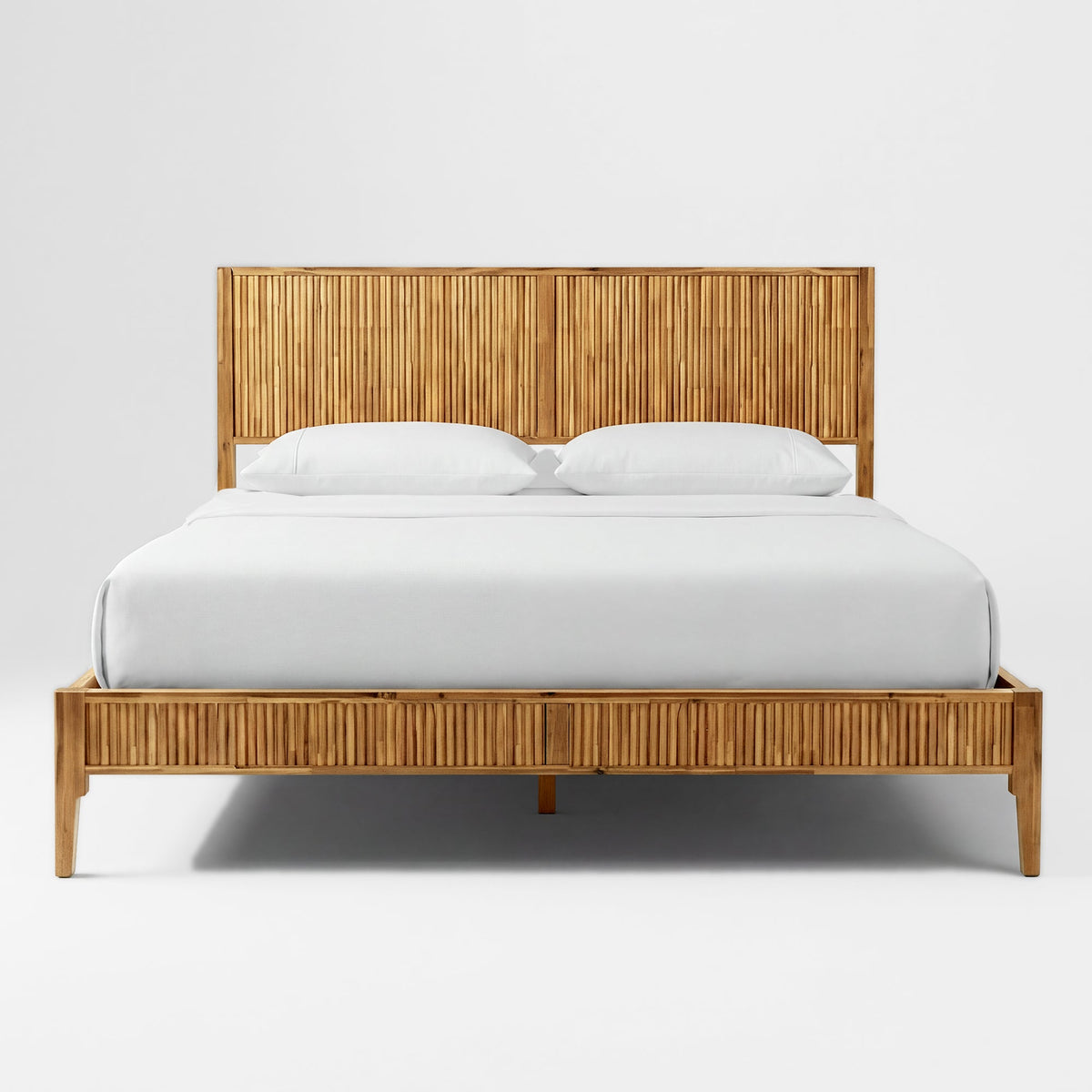 Solid wood bed frame with vertical slat headboard and platform base