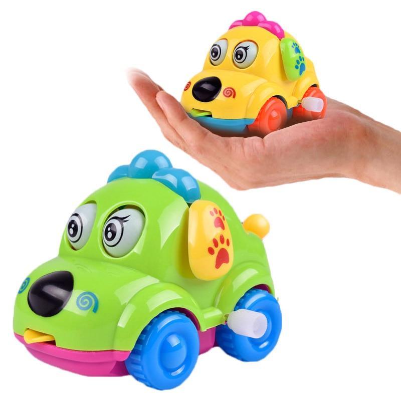 Green and yellow cartoon dog wind-up toy cars with raised paw detail and big eyes