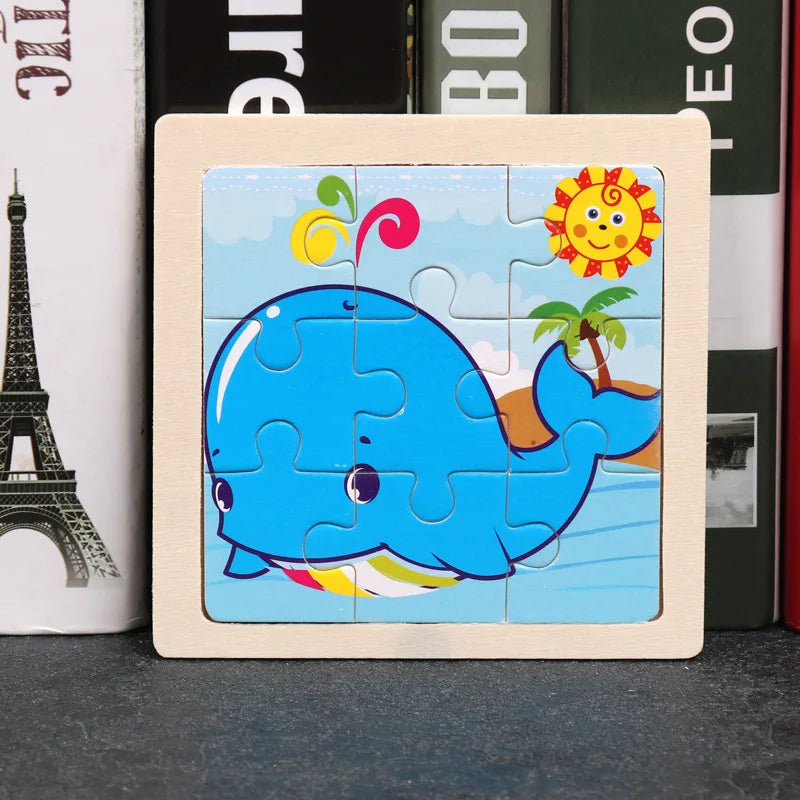 Kids wooden tangram jigsaw puzzle with cartoon blue whale in wooden frame