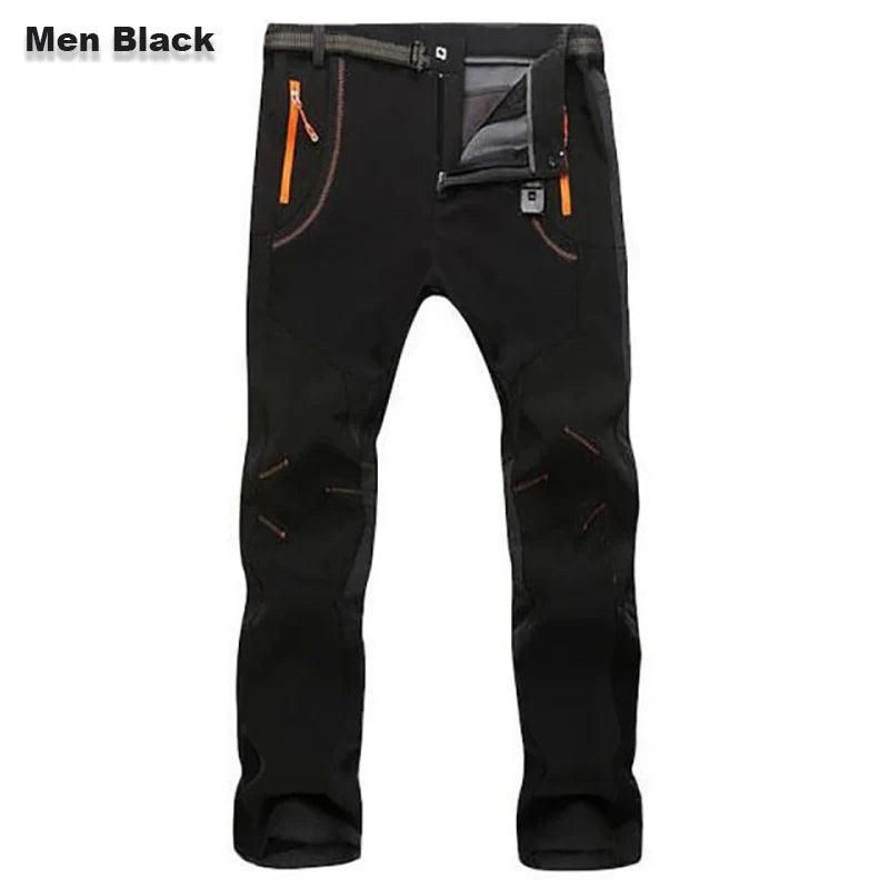 Men's black hiking pants with zip pockets, adjustable cuffs, and contrast orange trim