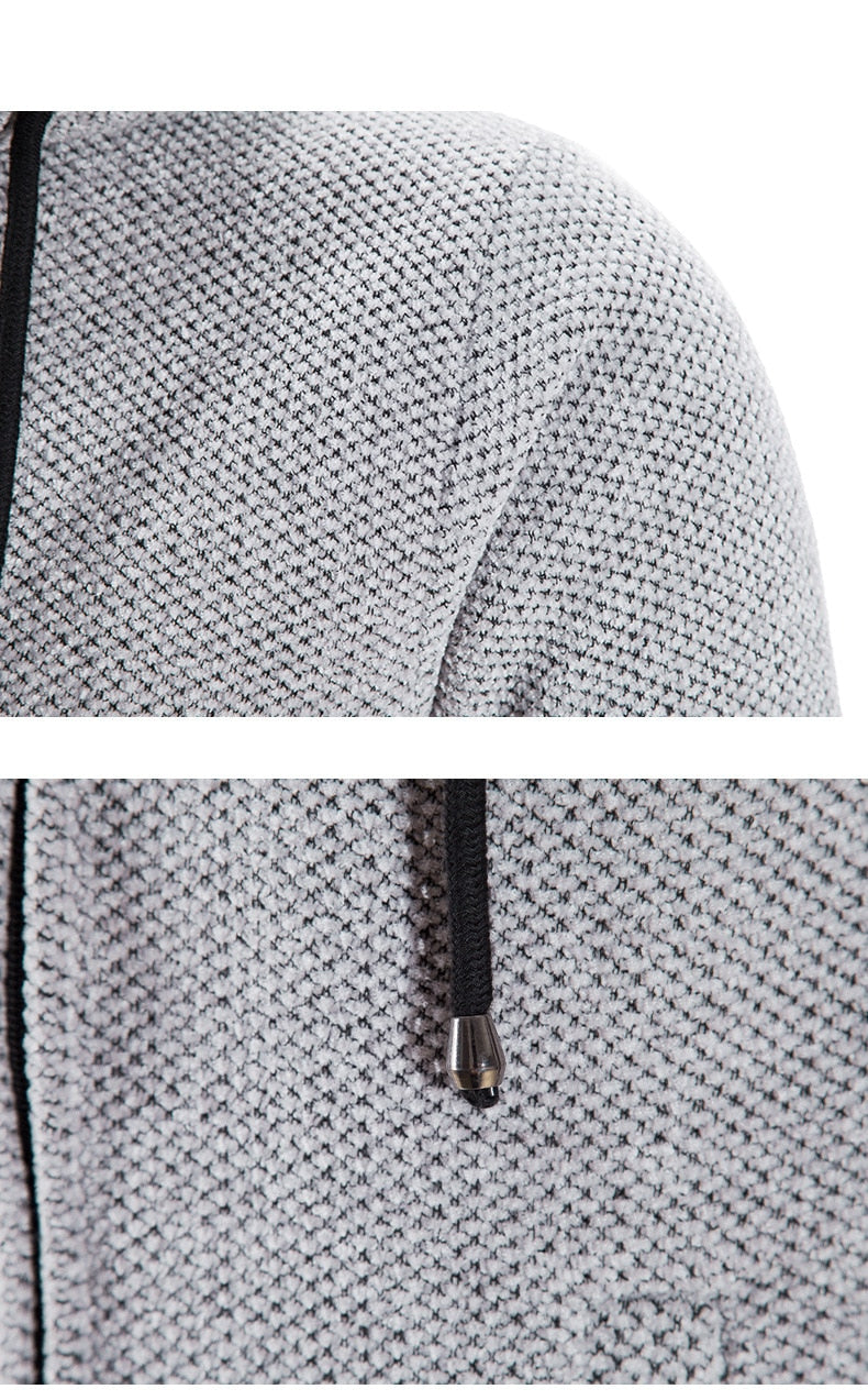 Light gray textured hooded cardigan coat detail: front zipper with metal pull