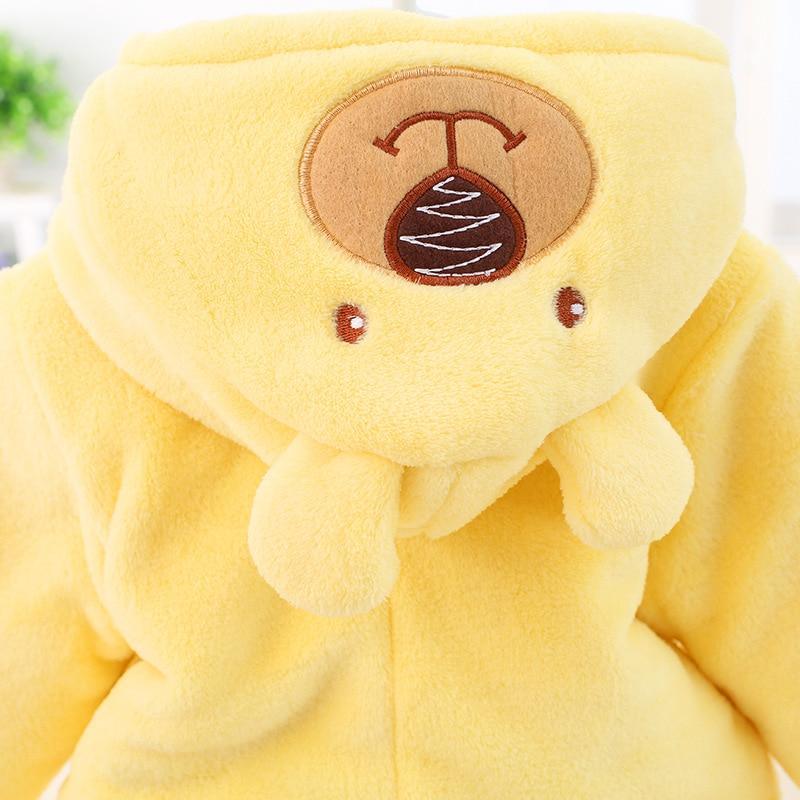 Yellow hooded plush baby romper with bear emblem on the hood and button detail