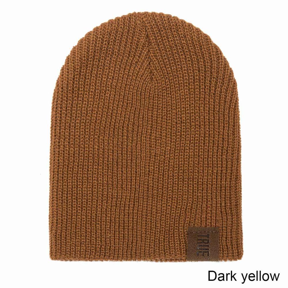Kids knit beanie and scarf set, dark yellow ribbed knit with logo patch